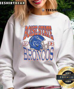 Alt Text: Classic Boise State Broncos sweatshirt featuring the iconic team helmet design, perfect for fans and casual wear.
