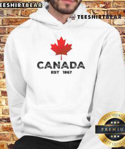 Vintage Canadian hoodie with maple leaf design, celebrating Canada Est. 1867, perfect for proud Canadians.