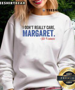 Funny meme sweatshirt featuring 'Nice, I don't really care' quote by Margaret J.D. Vance, perfect for casual wear.