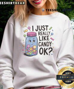Cute sweatshirt featuring the phrase I Just Really Like Candy with colorful candy graphics, perfect for candy lovers.