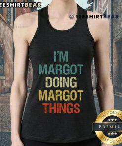 Vintage retro tank top featuring Margot, showcasing her unique style and personality in a playful, vibrant setting.