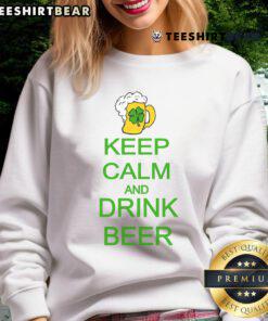 Cozy St. Patrick's Day sweatshirt featuring 'Keep Calm and Drink Beer' design, perfect for festive celebrations.