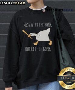 Cozy 'Nice Mess With The Honk You Get The Bonk' Goose sweatshirt featuring playful graphics and vibrant colors.