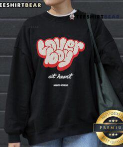 Nice Miguel Harichi Santo Studio Lover Boy At Heart Sweatshirt featured in a stylish urban setting, perfect for casual wear.