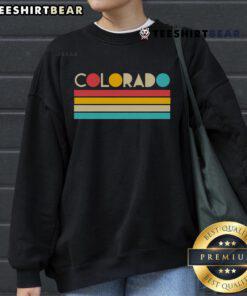 Colorful retro Colorado sweatshirt showcasing vibrant hues and a stylish design, perfect for casual wear.