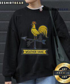 Vintage rooster weather vane design on a cozy sweatshirt, perfect for rustic charm and outdoor enthusiasts.