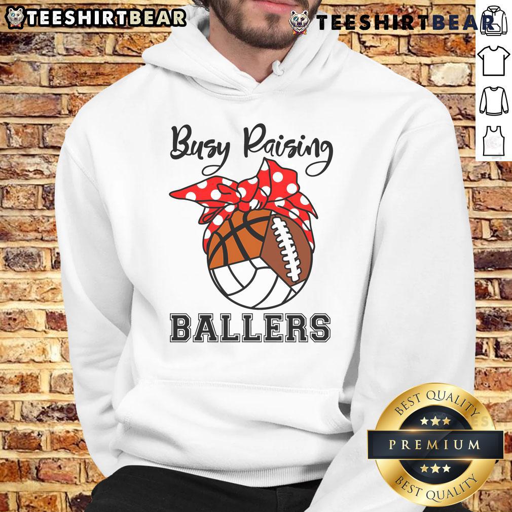 Official Busy Raising Ballers hoodie featuring volleyball, football, and basketball designs for sports enthusiasts.