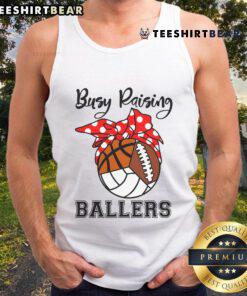 Alt Text: Official Busy Raising Ballers tank top featuring volleyball, football, and basketball designs for sports enthusiasts.
