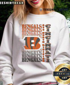 Official Cincinnati Bengals gradient wordmark sweatshirt featuring team colors and logo for fans and athletes.