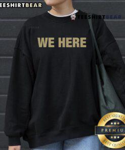 Official Coach Prime We Here Sweatshirt featuring bold text and a stylish design, perfect for fans and supporters.