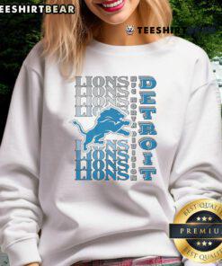 Alt Text: Official Detroit Lions Gradient Wordmark Sweatshirt featuring bold team colors and logo for ultimate fan style.