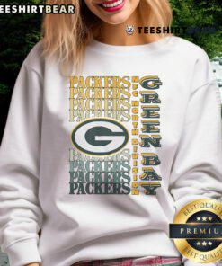 Alt Text: Official Green Bay Packers gradient wordmark sweatshirt featuring vibrant team colors and stylish design.