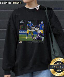 Kyren Williams wearing a black Los Angeles Rams NFL sweatshirt featuring Wild Card design, showcasing team spirit.