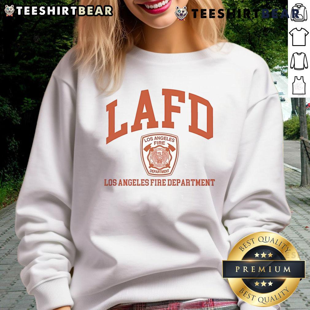 Tom Brady in a Los Angeles Fire Department sweatshirt, showcasing support for LAFD and community service.