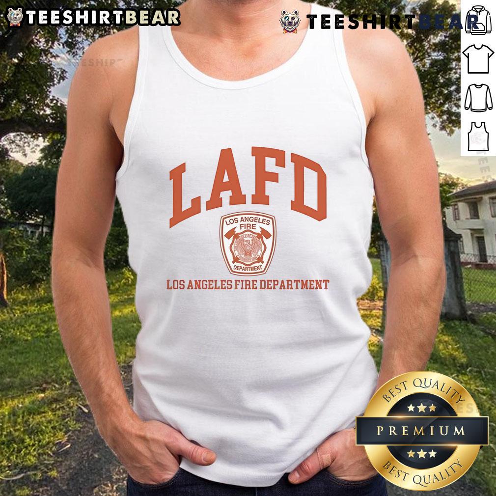 Alt Text: Tom Brady in a Los Angeles Fire Department tank top, showcasing his support for LAFD and sporty style.