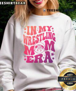 Retro sweatshirt featuring a groovy design, perfect for wrestling moms embracing their stylish era.