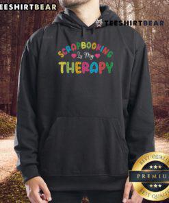 Cozy hoodie with 'Pretty Scrapbooking is My Therapy' design, perfect for craft lovers and scrapbook enthusiasts.