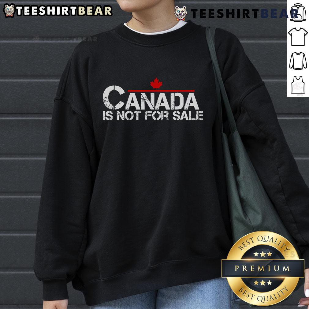Top Canada Is Not For Sale Proud Canadian Sweatshirt in vibrant red, showcasing national pride and casual style.
