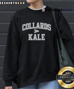Funny Black History Month sweatshirt featuring collards vs kale design, celebrating cultural heritage and humor.