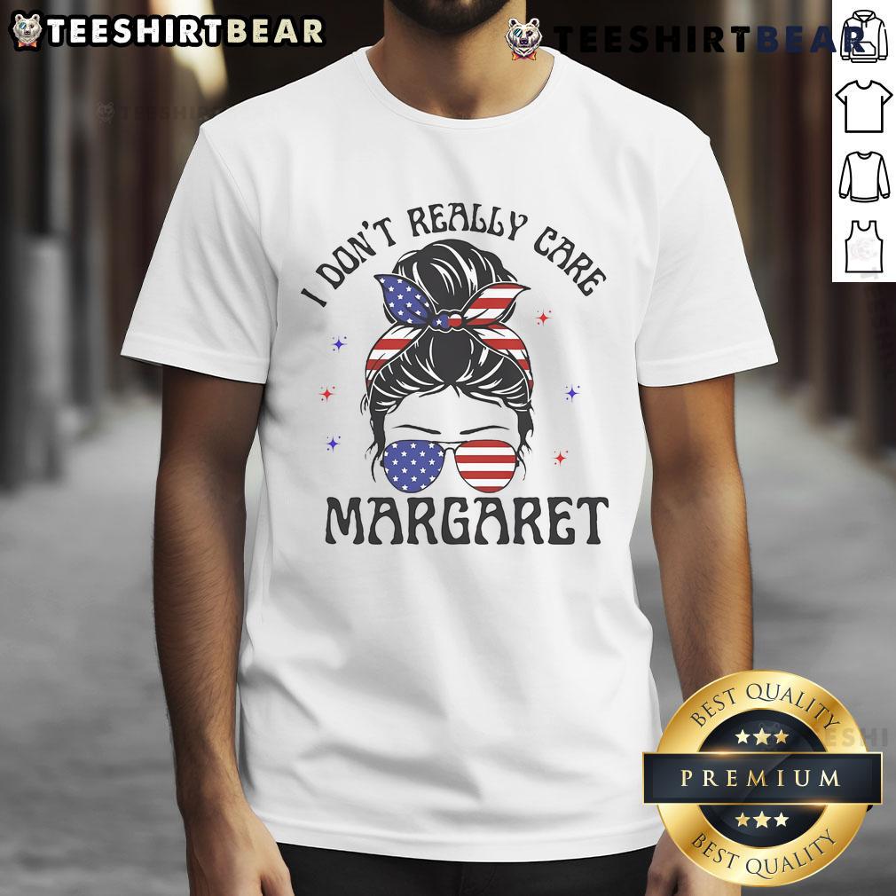 Alt Text: Top I Don't Really Care Margaret Messy Bun T-Shirt featuring a stylish design and casual fit for everyday wear.