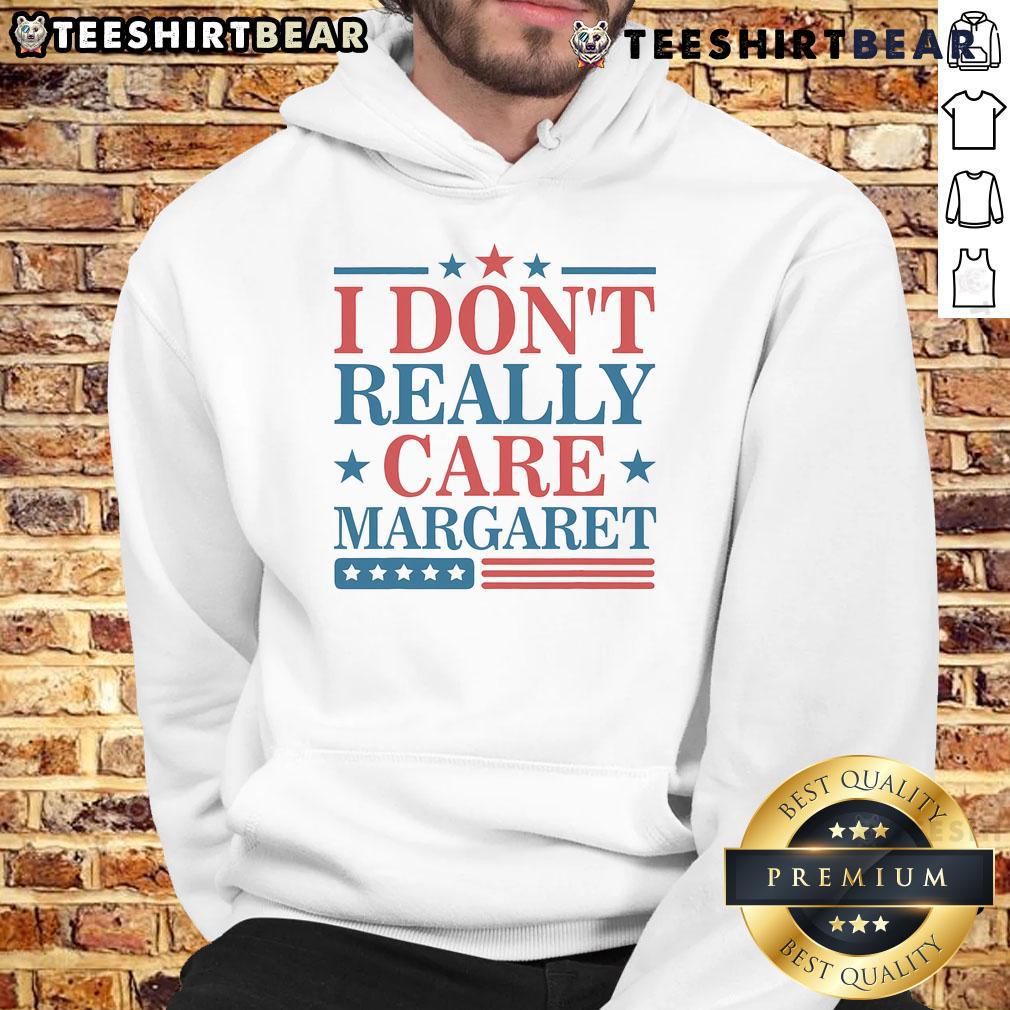 Alt Text: Minimalist US Flag hoodie featuring the phrase I Don't Really Care by Top I, perfect for casual style enthusiasts.