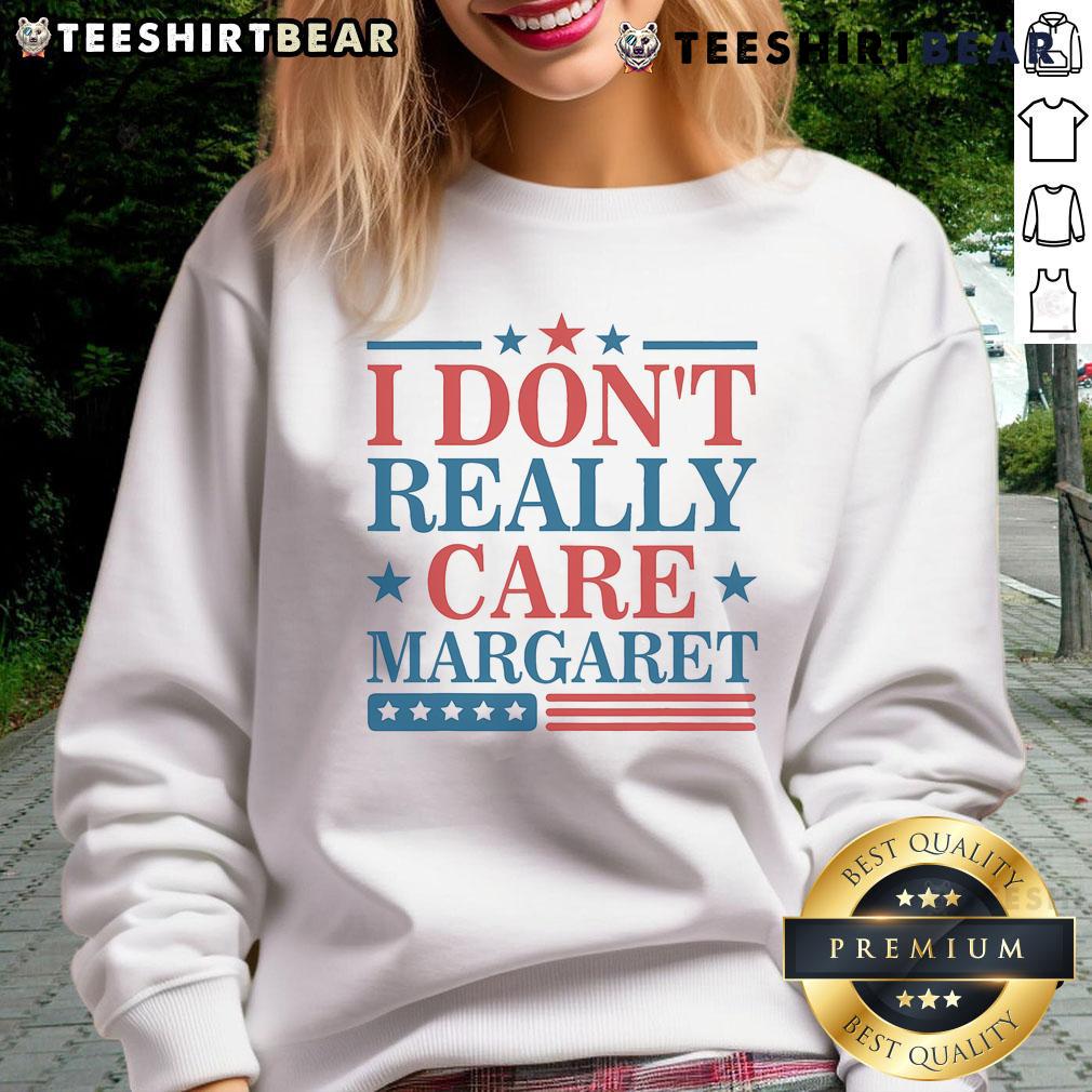 Minimalist US flag sweatshirt featuring 'I Don't Really Care' by Margaret, perfect for casual, stylish outfits.