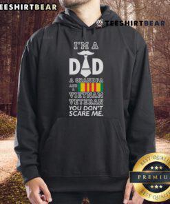 Alt Text: Comfortable hoodie featuring Top I'm A Dad, Grandpa, And A Vietnam Veteran You Don't Scare Me design. Perfect for veterans.