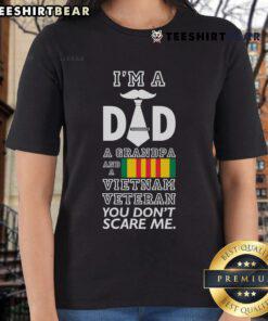 Top Im A Dad Grandpa And A Vietnam Veteran You Don't Scare Me Ladies Tee, featuring bold text on a casual shirt.