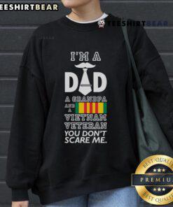 Top Im A Dad Grandpa And A Vietnam Veteran You Don't Scare Me Sweatshirt showcasing pride in family and military service.