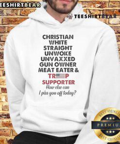 Top Trump supporter wearing a Christian, white straight hoodie at a rally, showing patriotic pride and political enthusiasm.