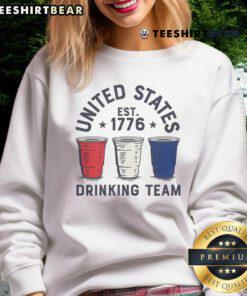 Alt Text: Awesome United States Drinking Team Est. 1776 Sweatshirt featuring bold text and patriotic colors for casual wear.