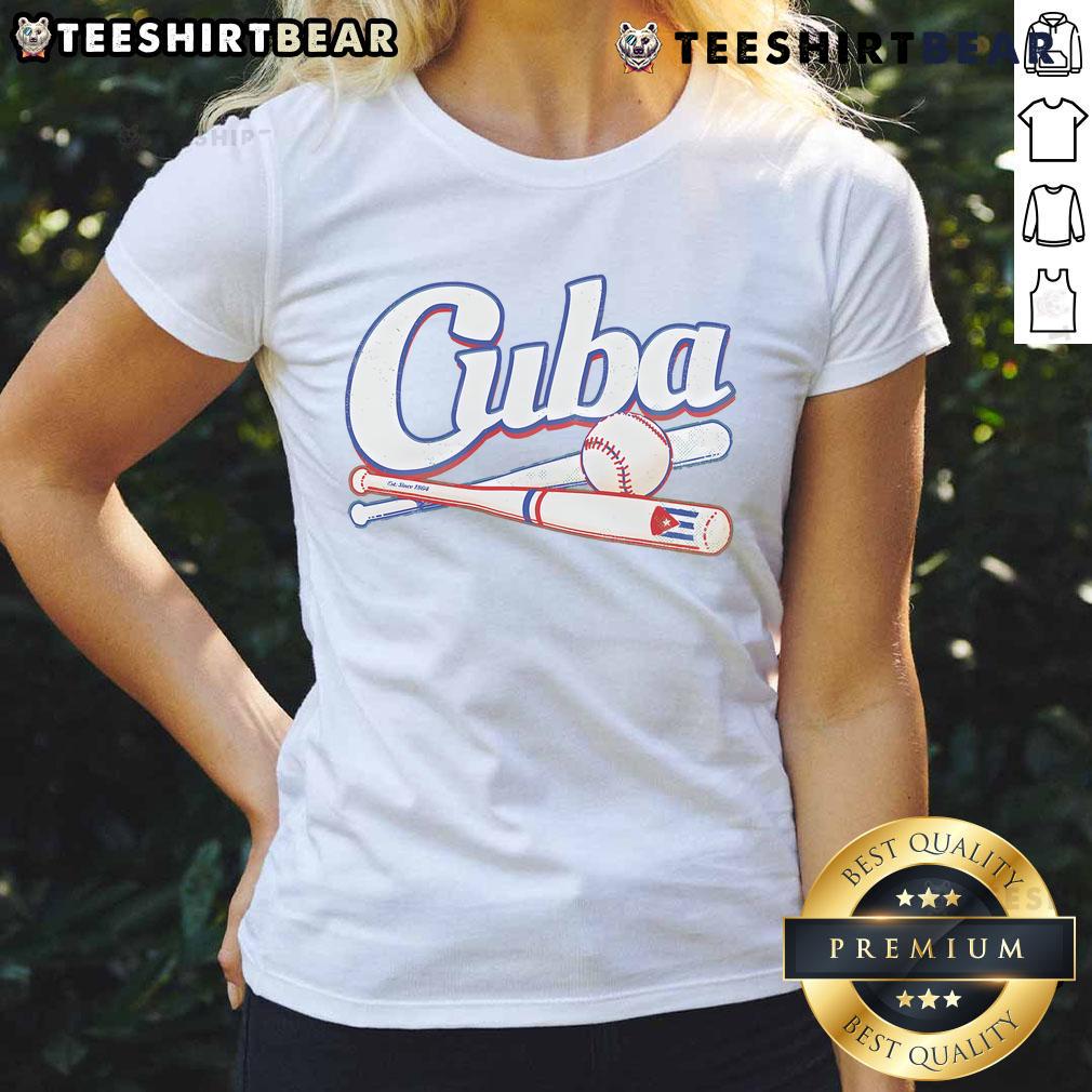 Cuban baseball fan wearing a ladies tee with the Cuban flag, showing team spirit and passion for the sport.
