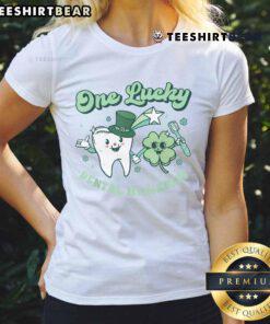 Alt Text: Cute Lucky Dental Hygienist in St. Patrick's Day tee with shamrock, celebrating with dental squad spirit.