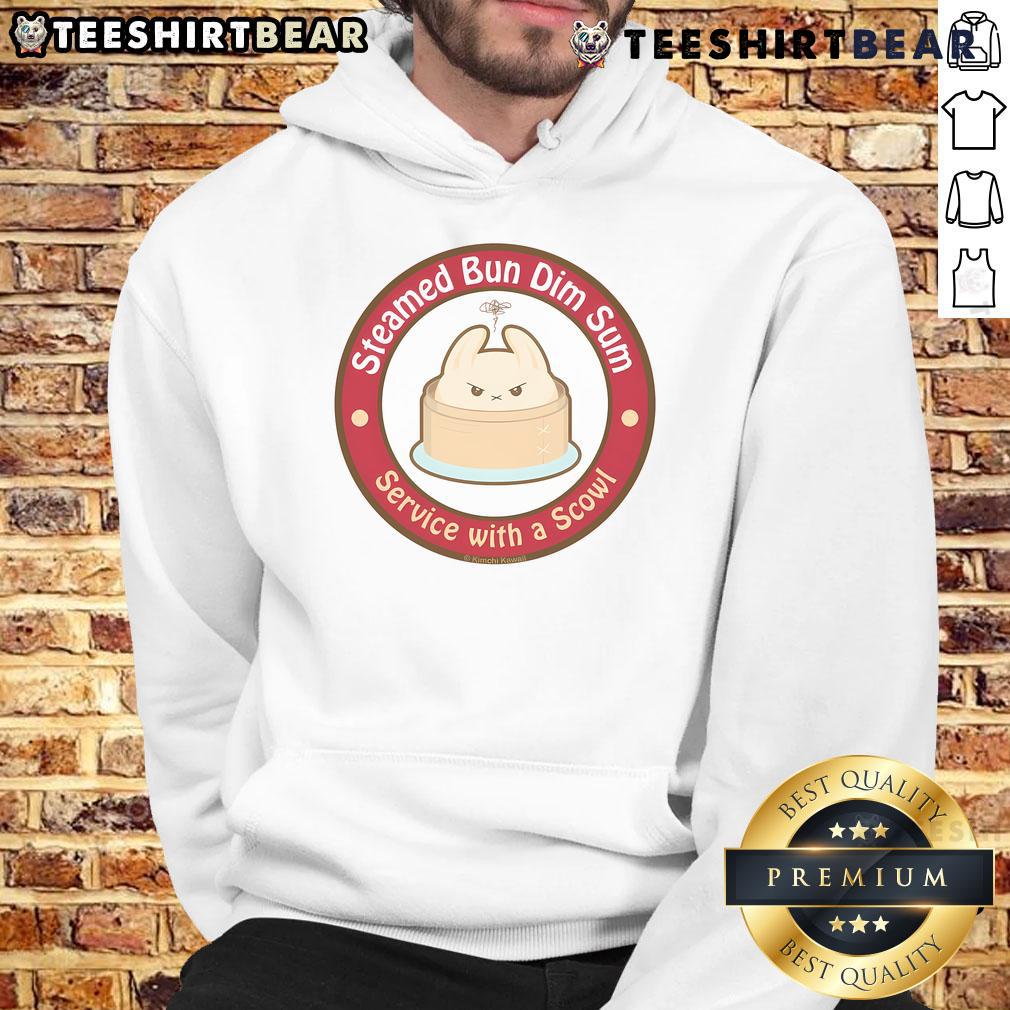 Cute steamed bun dim sum served with a playful scowl hoodie, showcasing a unique and fun dining experience.