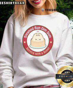 Adorable steamed bun dim sum service featuring a scowl sweatshirt, perfect for food lovers and cozy dining experiences.