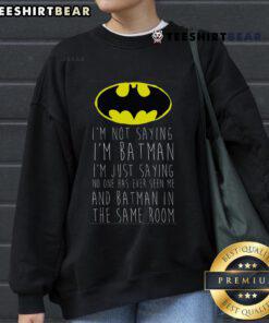 Funny 'I'm Not Saying I'm Batman' sweatshirt in black with white text, perfect for comic fans and casual wear.