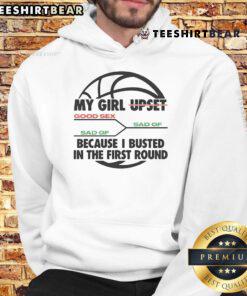 Funny girl upset in a basketball hoodie after losing in the first round, showcasing a playful sports moment.