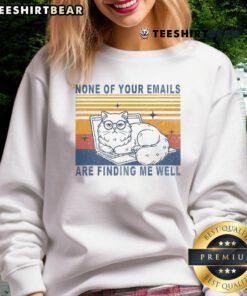 Cute cat in a vintage sweatshirt with the phrase None of your emails are finding me well for a humorous twist.