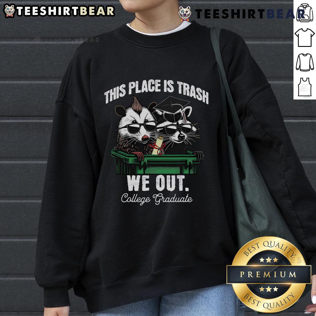 Funny 'This Place Is Trash' sweatshirt featuring a raccoon and opossum, perfect for college graduates.