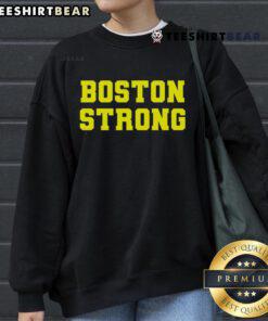 Boston Strong Marathon running sweatshirt, showcasing vibrant design and comfortable fit for dedicated runners.