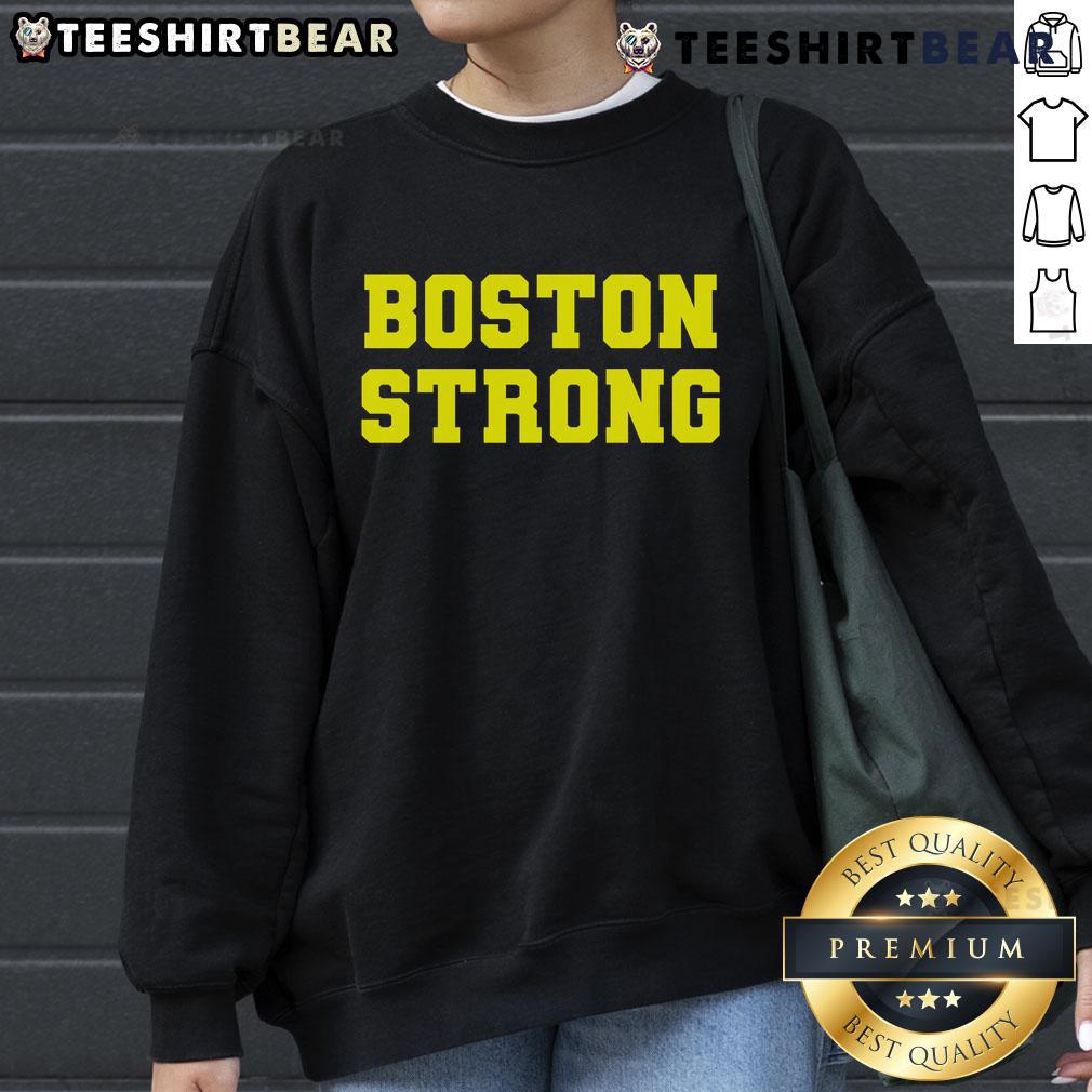 Boston Strong Marathon running sweatshirt, showcasing vibrant design and comfortable fit for dedicated runners.