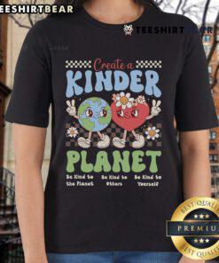 Trendy ladies tee featuring 'Good Create A Kinder Planet Be Kind' design, perfect for Earth Day celebrations and eco-conscious fashion.