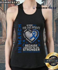 Good in March: Nurse wearing blue tank top for Colon Cancer Awareness, promoting patient support and awareness efforts.