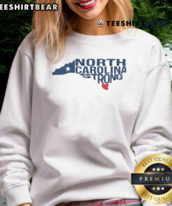 Good North Carolina Strong NC State sweatshirt displayed on a hanger, showcasing vibrant colors and stylish design.