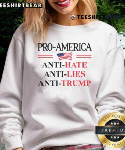 Pro-America anti-Trump sweatshirt featuring a bold 'Resist' sign and flag design, perfect for expressing political views.
