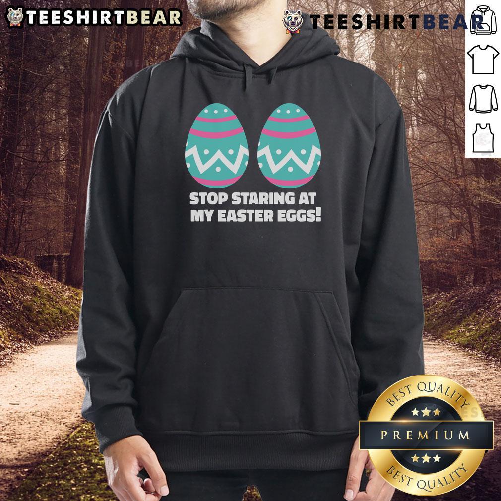 Happy Easter Funny Stop Staring At My Easter Eggs Hoodie featuring a playful design for festive celebrations.