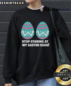Happy Easter Funny Sweatshirt with 'Stop Staring at My Easter Eggs' graphic design, perfect for festive celebrations.