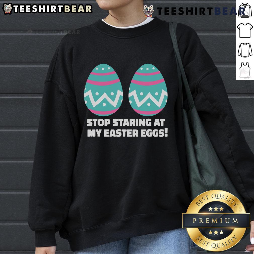 Happy Easter Funny Sweatshirt with 'Stop Staring at My Easter Eggs' graphic design, perfect for festive celebrations.