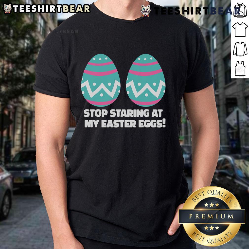 Funny 'Stop Staring At My Easter Eggs' T-Shirt design for a humorous Easter celebration, featuring colorful egg graphics.