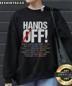 Alt Text: Hot Hands Off Protest Sweatshirt featuring bold text design promoting social justice and activism.